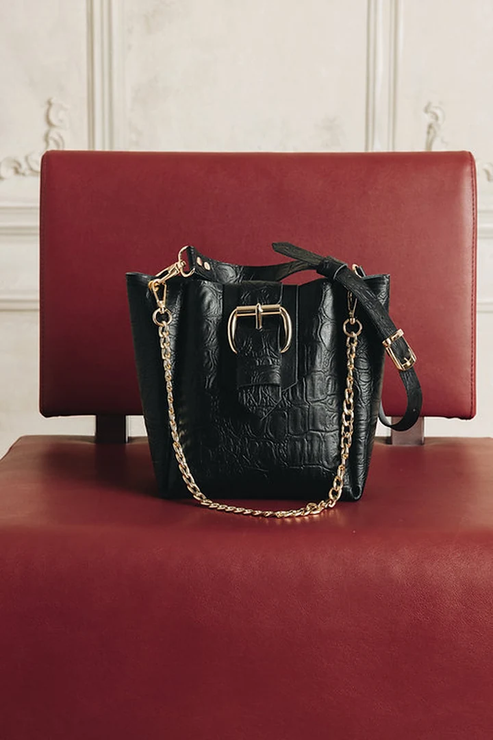 "Missing" shoulder bag